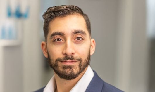 Smiling dentist at Pace Dental of Vienna