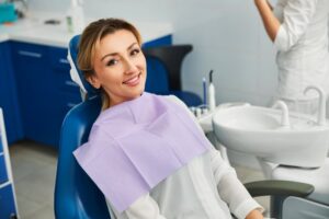 Woman smiling after getting a root canal